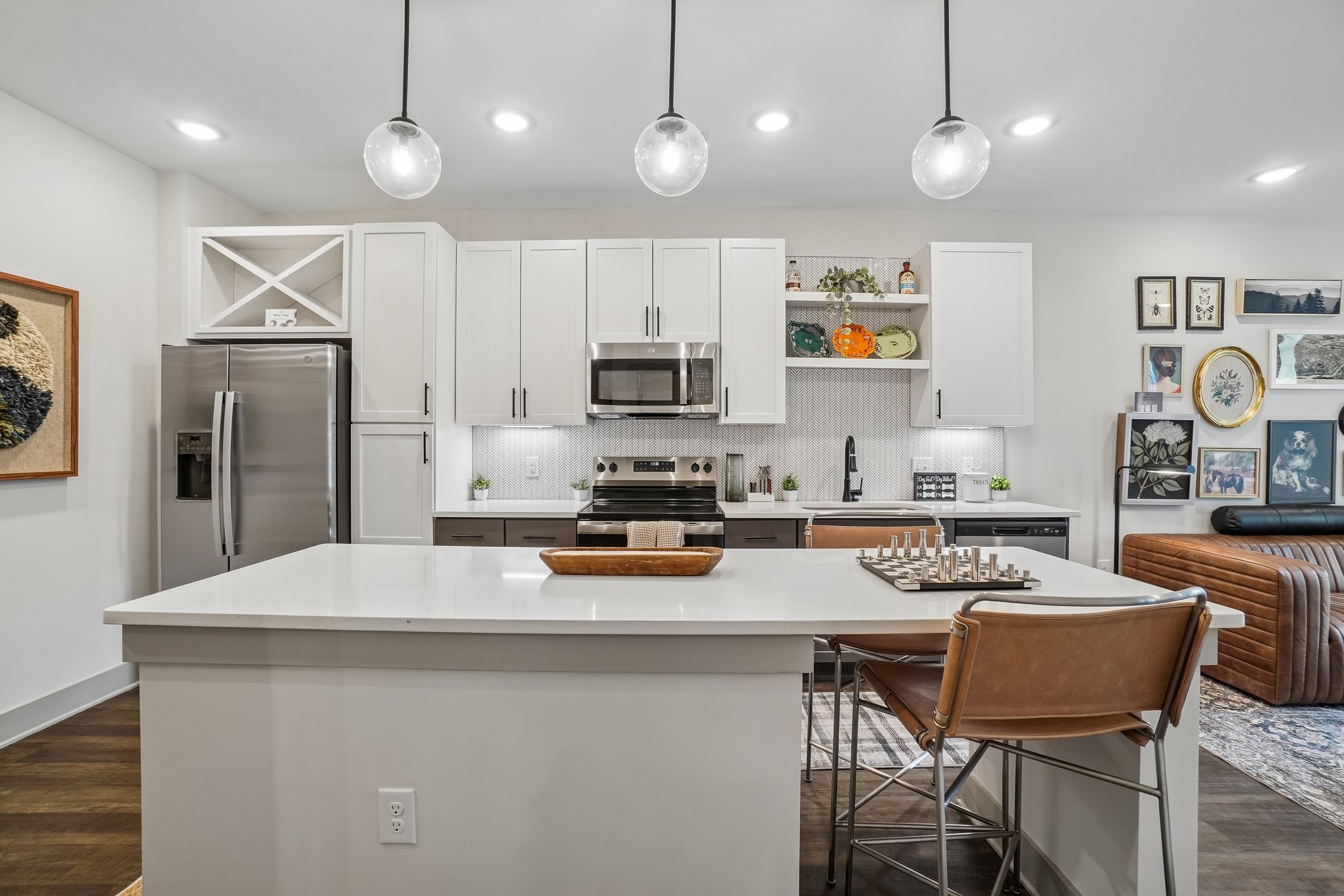 Model kitchen with quartz countertops and stainless-steel appliances