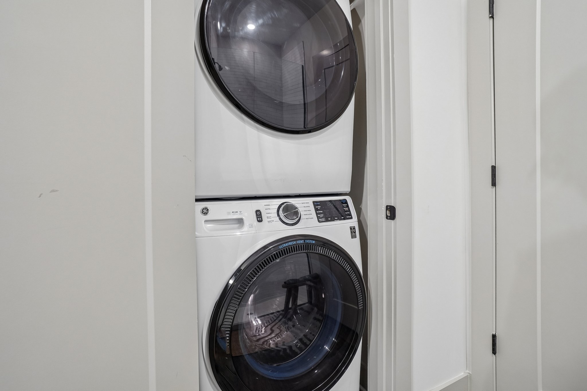 Stacked in-home washer and dryer at The Avery